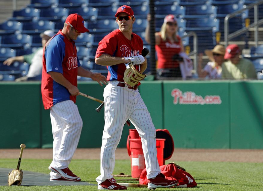 Philadelphia second baseman Chase Utley (right) missed all of spring training and the first 46 games of the regular season in 2011 because of knee problems. (Associated Press)