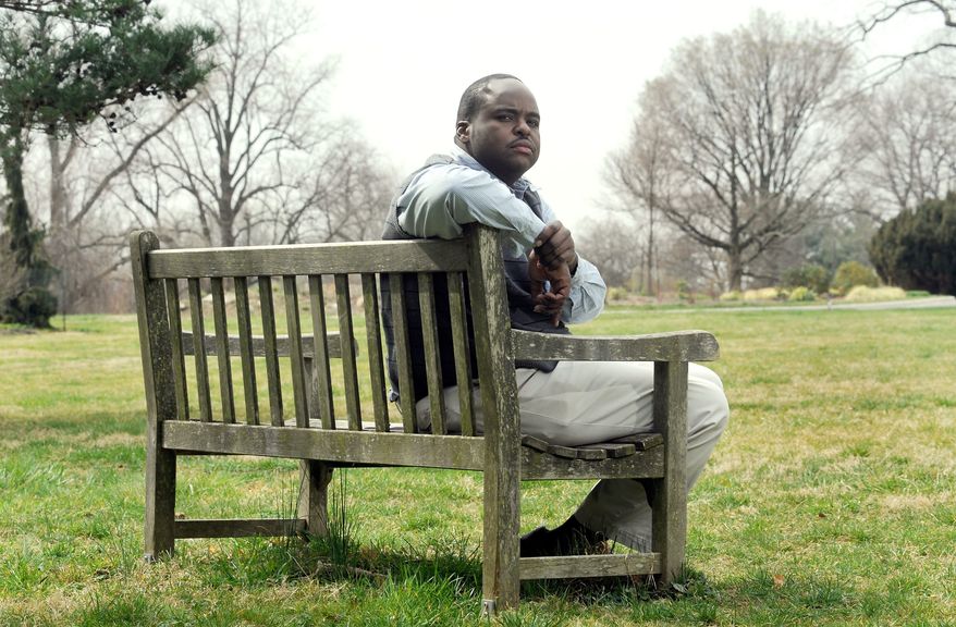 Robert Collins of Baltimore poses for a photo Friday, March 16, 2012, at Cylburn Arboretum in Baltimore. When Collins returned from a leave of absence from his job as a security guard with the Maryland Department of Public Safety and Correctional Services in 2010, he was asked for his Facebook login and password during a reinstatement interview, purportedly so the agency could check for any gang affiliations. (AP Photo/Steve Ruark)