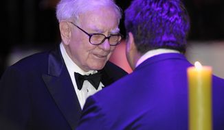 Warren Buffett attends the State Dinner with President Barack Obama and British Prime Minister David Cameron at the White House in Washington, Wednesday, March 14, 2012. (AP Photo/Susan Walsh)