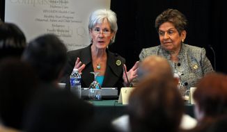 Secretary of Health and Human Services Kathleen Sebelius (left) and University of Miami President Donna Shalala, who had Mrs. Sibelius&#39; job in the Clinton administration, discuss the still-divisive Affordable Care Act at a community health center in Miami. (Associated Press)