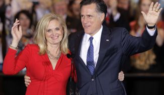 Republican presidential candidate, former Massachusetts Gov. Mitt Romney and his wife Ann wave as they leave at an election night event in Schaumburg, Ill., Tuesday, March 20, 2012. Romney won the Illinois Primary. (AP Photo/Nam Y. Huh)