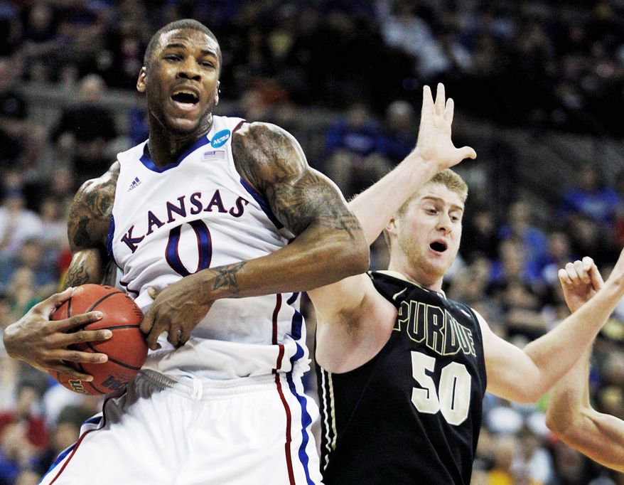 Kansas forward Thomas Robinson has averaged 17.9 points per game and 11.8 rebounds per game this season. (Associated Press)
