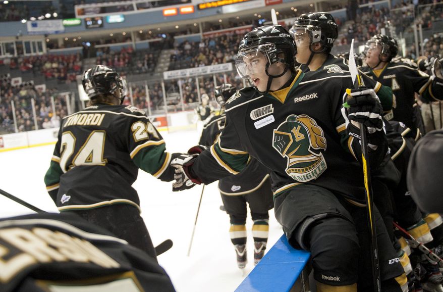 London Knights winger Seth Griffith bumps fists with captain Jarred Tinordi after a Knights goal during their junior hockey game against the Oshawa Generals at the John Labatt Centre in London, Ontario, Canada on Friday March 2, 2012. Tinordi's father, Mark, is a former player of the Washington Capitals. (Craig Glover/Special to The Washington Times)