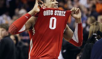 Ohio State forward Jared Sullinger celebrates his team&#x27;s 77-70 victory over Syracuse in the East Regional final game in the NCAA men&#x27;s college basketball tournament, Saturday, March 24, 2012, in Boston. (AP Photo/Elise Amendola)
