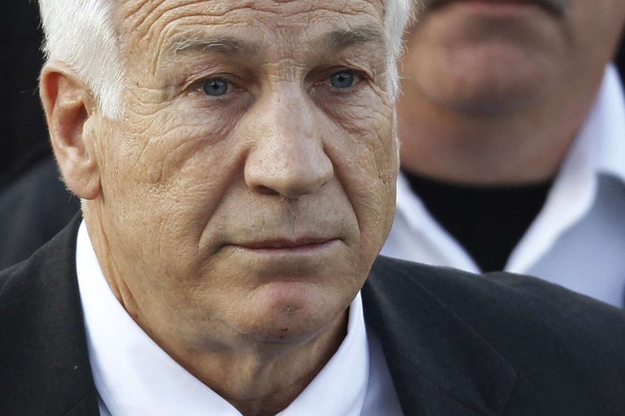 ** FILE ** In this Dec. 13, 2011, file photo, Jerry Sandusky, the former Penn State assistant football coach charged with sexually abusing boys, leaves the Centre County Courthouse in Bellefonte, Pa. A psychologist who looked into a 1998 allegation against Sandusky told police at the time that his behavior fit the profile of a likely pedophile, NBC News reported Saturday, March 24, 2012. (AP Photo/Matt Rourke, File)