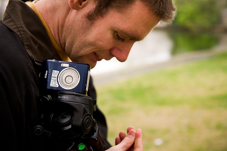 Autistic adult Matt D. with Community Services for Autistic Adults and Children, based in Montgomery Village, Md., gets ready to depart after taking photographs of the Cherry Blossoms along the Tidal Basin, Washington, D.C., Wednesday, March 21, 2012. The “InFocus Project†is a way for adults with autism to develop forms of self expression and social skills while producing work that has been featured in art shows, given to donors to C.S.A.A.C., and sold on an online store. (Andrew Harnik/The Washington Times)