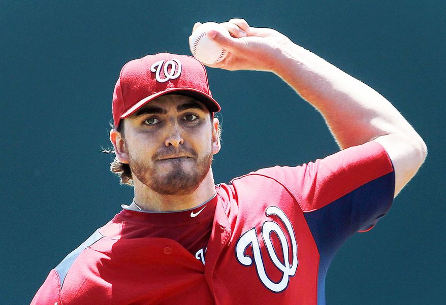 John Lannan went into spring training in three-way battle with Chien-Ming Wang and Ross Detwiler for the No. 5 sport in the Nationals' rotation. (Associated Press)