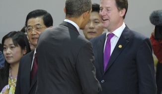 President Obama (center) talks with British Deputy Prime Minister Nick Clegg on March 26, 2012, before the leaders&#39; dinner at the Nuclear Security Summit at the Coex Center in Seoul. Chinese President Hu Jintao is at second left. (Associated Press)