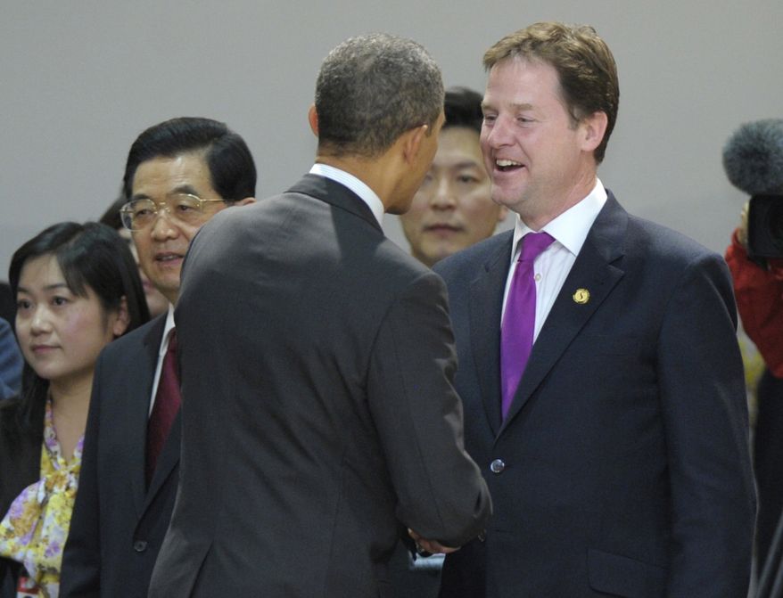President Obama (center) talks with British Deputy Prime Minister Nick Clegg on March 26, 2012, before the leaders' dinner at the Nuclear Security Summit at the Coex Center in Seoul. Chinese President Hu Jintao is at second left. (Associated Press)