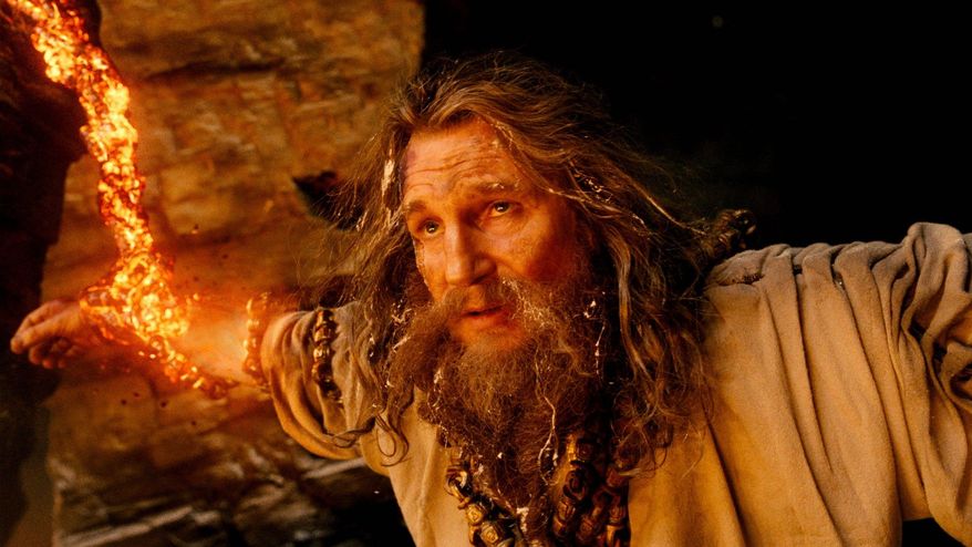 Liam Neeson as Zeus is in a hard place between two rocks in "Wrath of the Titans," a noisy sequel to 2010's "Clash of the Titans." (Warner Bros. and Legendary Pictures via Associated Press)