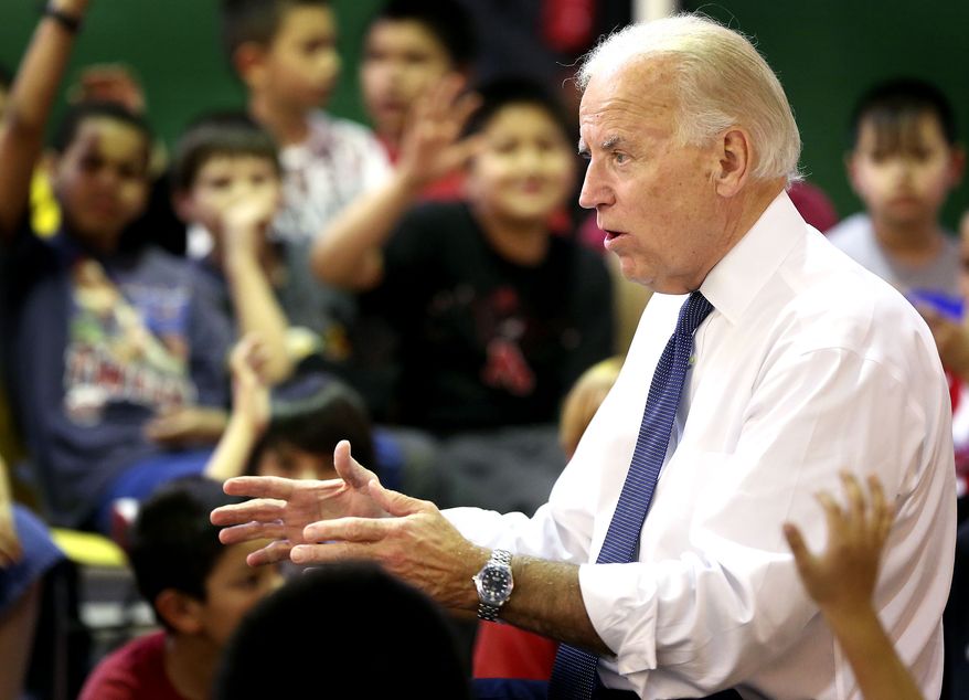 Vice President Joseph R. Biden Jr., talks March 28, 2012, to students during his stop at the Boys Club in Sioux City, Iowa. (Associated Press/Sioux City Journal)