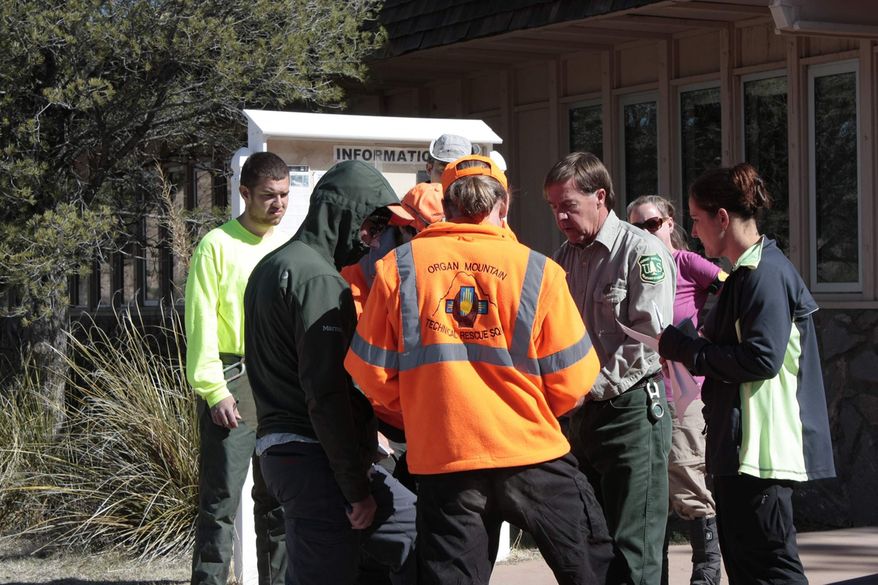 In this Friday, March 30, 2012, photo, provided by New Mexico Search and Rescue via Silver City Daily Press & Independent, search-and-rescue team members prepare to search for missing runner Micah True, in Silver City, N.M. (AP Photo/New Mexico Search and Rescue via Silver City Daily Press & Independent)