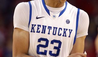 Kentucky forward Anthony Davis had 18 points and 14 rebounds in a 69-61 semifinal win over Louisville on Saturday. (Associated Press)