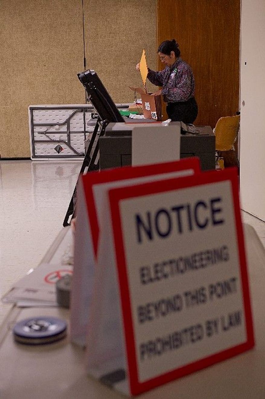 Judith Mangubat, precinct captain for voting Precinct 85, makes sure all the paperwork is in order in anticipation of tomorrow's vote at polling place Specialty Hospital of Washington in Northeast Washington, D.C. on Monday, April 2, 2012. This precinct has a little more than 4,000 registered voters. The polls open at 7 a.m. (Barbara L. Salisbury/The Washington Times)