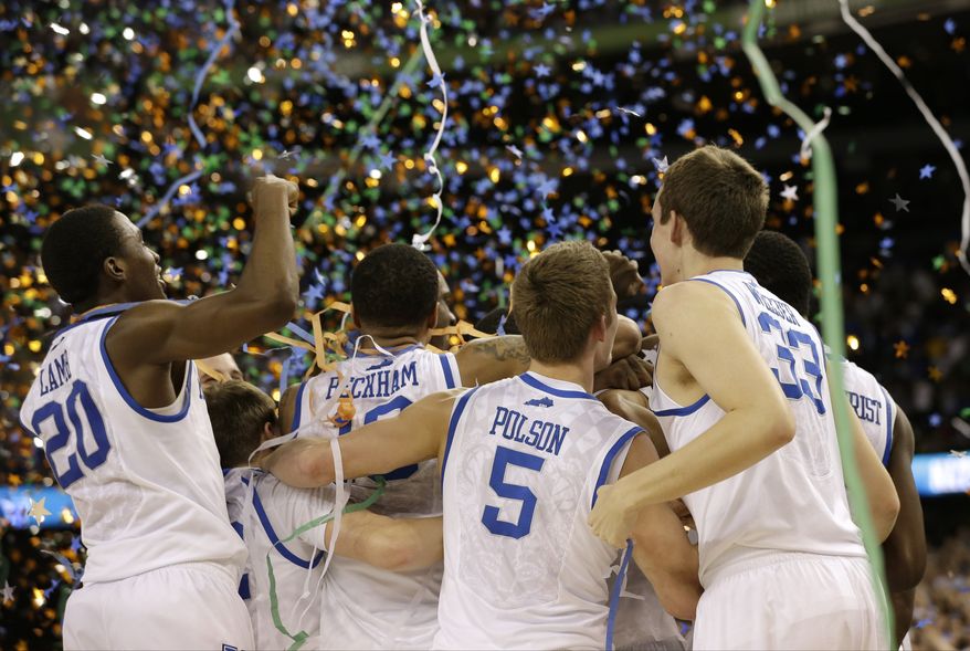 Kentucky players celebrate their NCAA tournament championship against Kansas on Monday, April 2, 2012, in New Orleans. Kentucky won 67-59. (AP Photo/David J. Phillip)