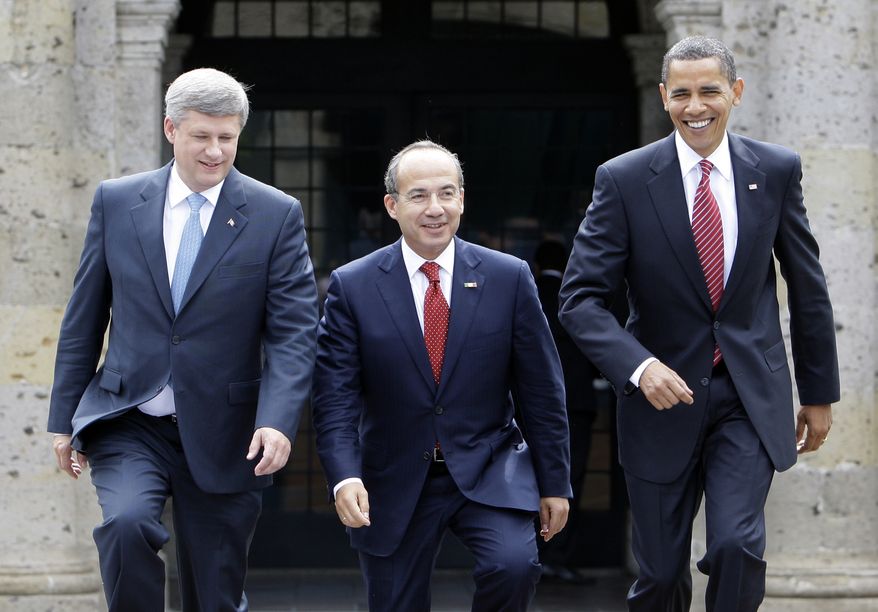 ** FILE ** President Obama (right), Mexican President Felipe Calderon (center) and Canadian Prime Minister Stephen Harper meet for a North American summit in Guadalajara, Mexico, in August 2009. (AP Photo/Alex Brandon, File)