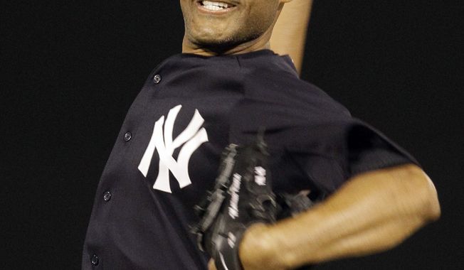 New York Yankees relief pitcher Mariano Rivera delivers a warm-up pitch before the fourth inning of a spring training baseball game against the Pittsburgh Pirates at Steinbrenner Field in Tampa, Fla., Tuesday, March 20, 2012. (AP Photo/Kathy Willens)