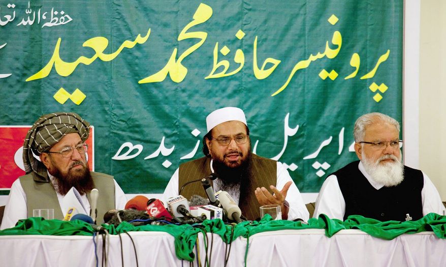 The U.S. State Department has placed a $10 million bounty on Hafiz Mohammad Saeed (center), who founded the militant group Lashkar-e-Taiba. (Associated Press)