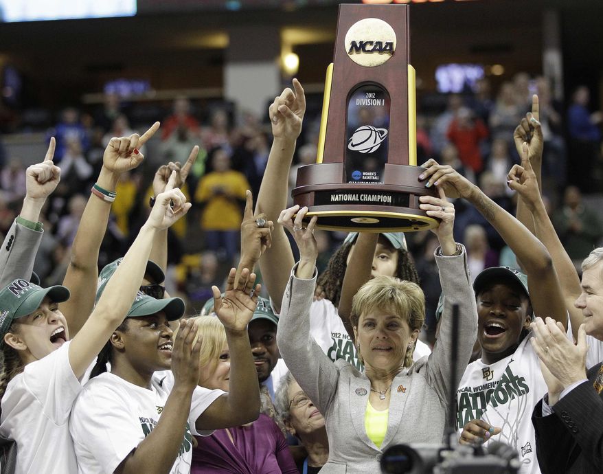 Baylor head coach Kim Mulkey and players celebrate after the NCAA Women's Final Four college basketball championship game against Notre Dame, in Denver, Tuesday, April 3, 2012. Baylor won the championship 80-61.(AP Photo/Julie Jacobson)