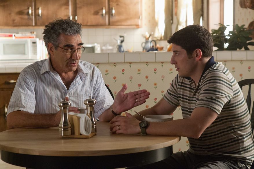 Eugene Levy (left) is back as Jason Biggs' father in "American Reunion," but in the latest sequel in the "American Pie" franchise they seem like a pair of ventriloquist dummies talking among themselves. (Universal Pictures via Associated Press)