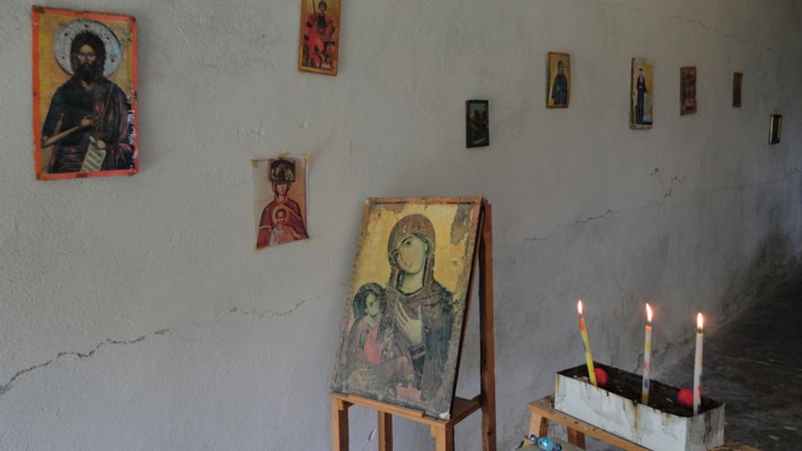 The original icons at the Church of St. Martin in Joronisht, Shpati, were destroyed during the communist regime and have been replaced with cheap copies. (Eckehard Pistrick/Special to The Washington Times)