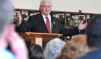 ** FILE ** Republican presidential candidate Newt Gingrich speaks at a public meeting at the Magnolia Volunteer Fire Company on Thursday, April 5, 2012, in Magnolia, Del. (AP Photo/Wilmington News-Journal, Gary Emeigh)