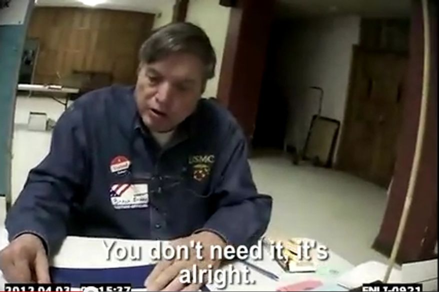 A D.C. poll worker tells a man from James O'Keefe's Project Veritas