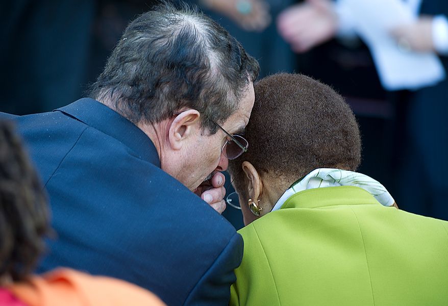 Mayor Vincent Gray has a private conversation with Congresswoman Eleanor Holmes Norton during the opening of the newly renovated Howard Theatre in Washington, D.C., on Monday, April 9, 2012. Names like Duke Ellington, Marvin Gaye and Diana Ross used to play the club, which many residents remember cutting school to go to as well. The theater will now offer a full-scale kitchen, bar and of course, live acts. (Barbara L. Salisbury/The Washington Times)