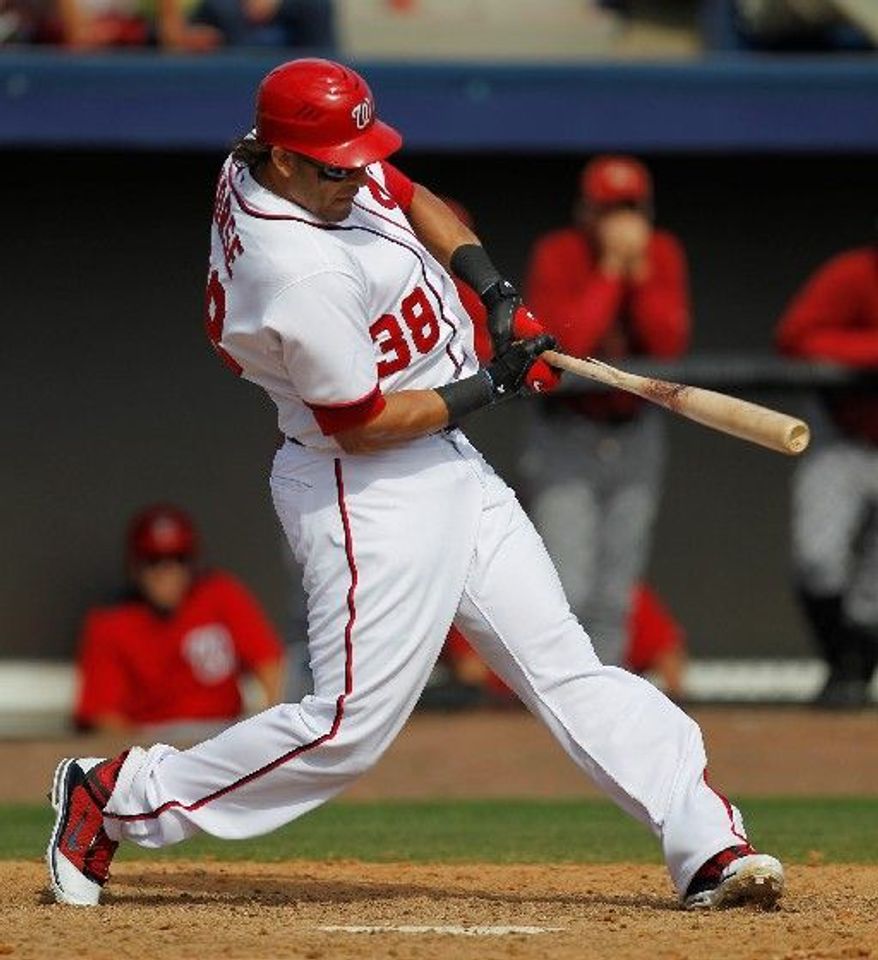 Michael Morse batted .303 with 31 home runs and 95 RBI for the Nationals in 2011, mostly as the first baseman. This year, he's slotted for left field. (Associated Press)