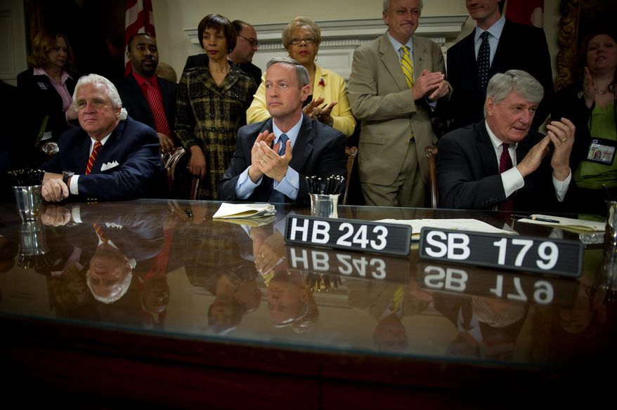 Maryland Gov. Martin O'Malley is flanked by state Senate President Thomas V. Mike Miller Jr. (left) and House Speaker Michael E. Busch during a bill signing Tuesday. The General Assembly closed at midnight Monday with no budget passed, so automatic cuts will kick in unless the governor calls a special session before July 1. (Rod Lamkey Jr./The Washington Times)