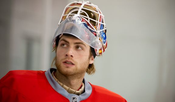 Washington Capitals goalie Braden Holtby (70) heads out to the ice for a morning practice at Kettler Capitals Iceplex, Arlington, Va., Tuesday, April 10, 2012. (Andrew Harnik/The Washington Times)