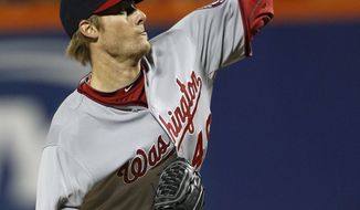 Washington Nationals starting pitcher Ross Detwiler delivers against the New York Mets in the second inning in New York, Tuesday, April 10, 2012. (AP Photo/Kathy Willens)
