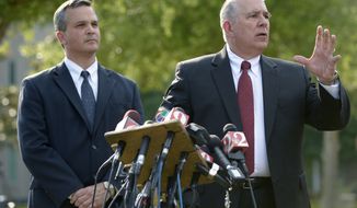Hal Uhrig (right) and Craig Sonner, former attorneys for George Zimmerman, speak to reporters during a news conference on Tuesday, April 10, 2012, in Sanford, Fla., to announce that both lawyers had quit as Mr. Zimmerman&#39;s legal representatives. (AP Photo/Phelan M. Ebenhack)

