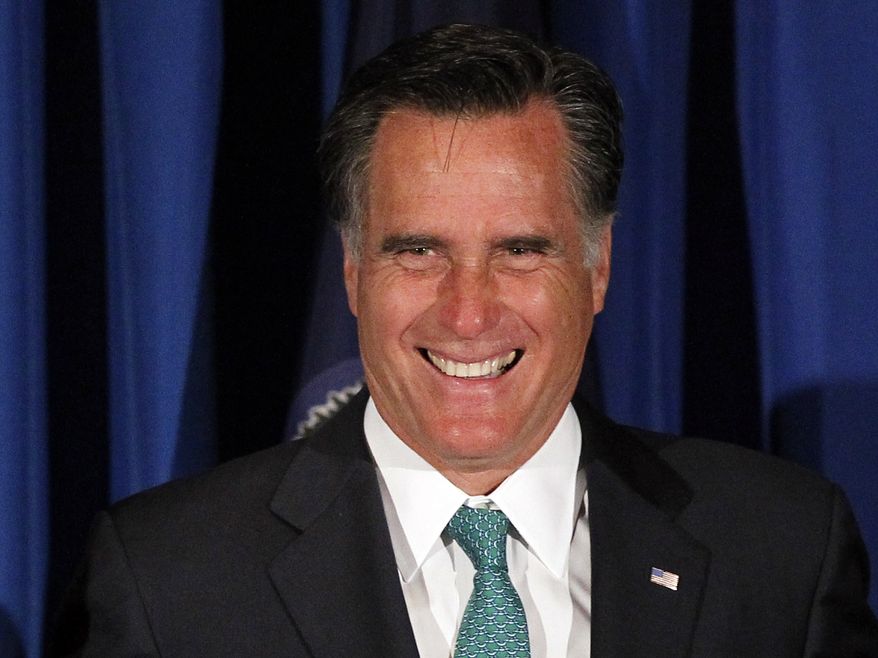 Republican presidential candidate and former Massachusetts Gov. Mitt Romney smiles as he is introduced April 10, 2012, by Sen. Pat Toomey, Pennsylvania Republican, at the spring reception for the Republican Committee of Chester County in Mendenhall, Pa. (Associated Press)