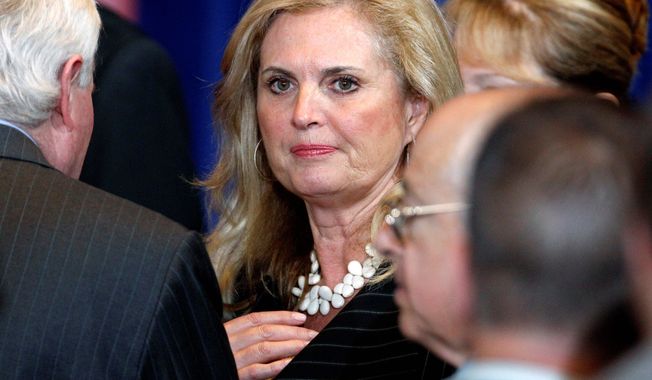 Ann Romney, wife of Republican presidential candidate Mitt Romney, was the target of criticism from a Democratic Party activist who said she &quot;never worked a day in her life.&quot; The remark created a political firestorm that led to President Obama distancing himself from the comment. (Associated Press)