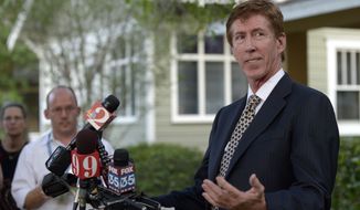 ** FILE ** Mark O&#39;Mara, attorney for George Zimmerman, addresses reporters outside his offices in Orlando, Fla., April 11, 2012. (Associated Press)