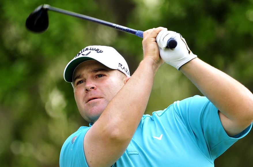 Colt Knost watches his drive from the 13th tee during the second round of the RBC Heritage golf tournament in Hilton Head Island, S.C., on Friday, April 13, 2012. (AP Photo/Stephen Morton)