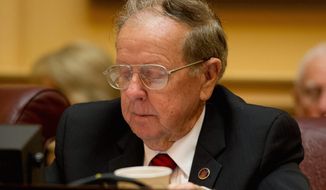Sen. Charles J. Colgan, Prince William Democrat and a budget conferee, signed the conference report but has not said whether he will vote for the bill on the floor Tuesday. (Andrew Harnik/The Washington Times)
