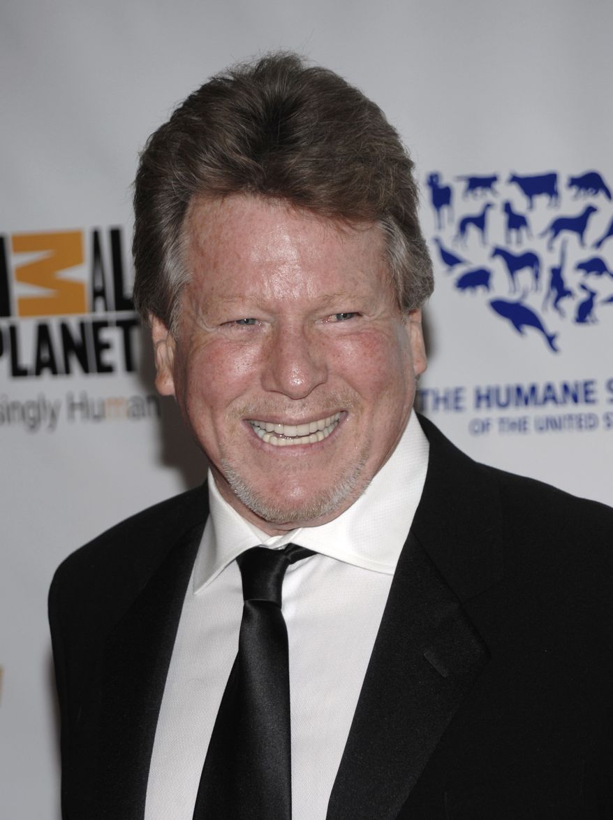 ** FILE ** In this March 19, 2011, file photo, actor Ryan O'Neal arrives at the Genesis Awards benefiting the Humane Society in Los Angeles. O'Neal has been diagnosed with Stage 2 prostate cancer. (AP Photo/Dan Steinberg, file)