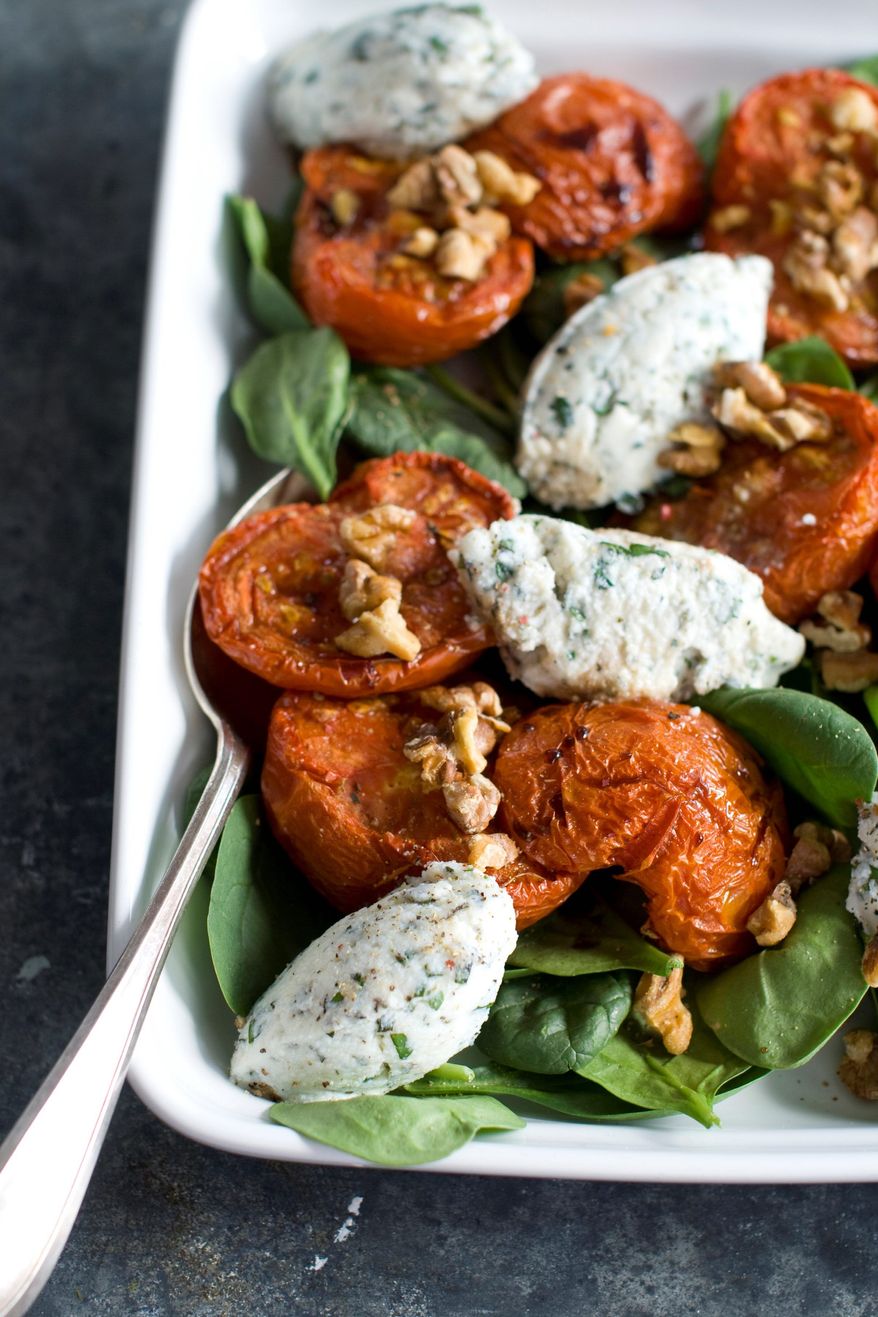 Crunchy walnuts are featured in this composed salad made from roasted tomatoes and creamy, herbed ricotta cheese. Carefully toast raw nuts and seeds to get the most out of their deep, rich flavor. (Associated Press)