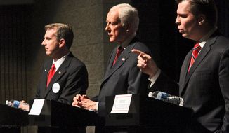 Sen. Orrin Hatch (center) is facing a re-election challenge from fellow Republicans state Rep. Chris Herrod (left) and former state Sen. Dan Liljenquist. All three participated in a debate April 4. Delegates at a weekend state convention will vote for the party&#39;s nominee. Mr. Hatch is seeking a seventh term and two recent polls of likely voters bolster his chances. (The Salt Lake Tribune via Associated Press)