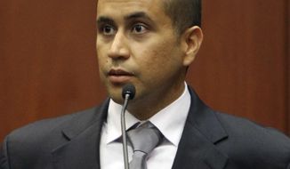 George Zimmerman appears before Circuit Judge Kenneth R. Lester Jr. Friday, April 20, 2012, during a bond hearing in Sanford, Fla. Lester says Zimmerman can be released on $150,000 bail as he awaits trial for the shooting death of Trayvon Martin. (AP Photo/Orlando Sentinel, Gary W. Green, Pool)