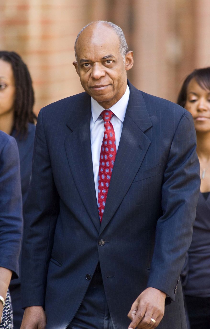** FILE ** In this Aug. 5, 2009, file photo, former Louisiana Rep. William Jefferson walks to federal court in Alexandria, Va. The former Louisiana congressman convicted of taking bribes will have to begin serving a 13-year prison sentence within two weeks. (AP Photo/Kevin Wolf, File)
