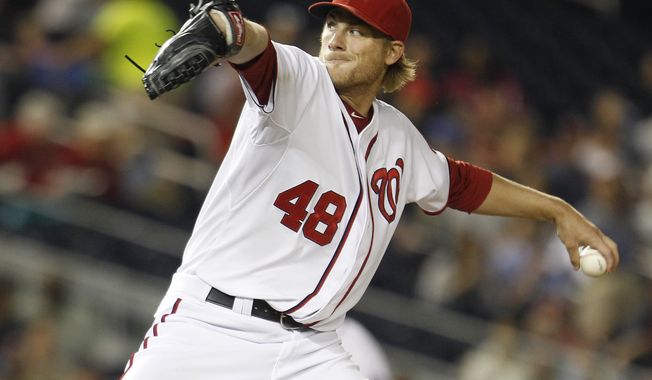 Washington Nationals starting pitcher Ross Detwiler delivers during the fourth inning against the Miami Marlins on Friday, April 20, 2012, in Washington. The Nationals defeated the Marlins 2-0. (AP Photo/Evan Vucci)