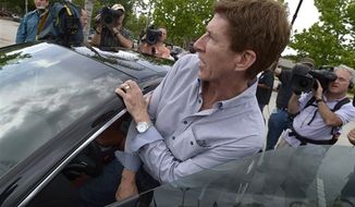 Mark O&#39;Mara, attorney for George Zimmerman, gets into his car after speaking with his client at the Seminole County Jail in Sanford, Fla. on Saturday, April 21, 2012. Zimmerman was a neighborhood watch volunteer who shot unarmed teenager, Trayvon Martin. O&#39;Mara said it would take a few days before Zimmerman is released. His family needs time to secure collateral for the bail, Zimmerman needs to be fitted with an electronic monitoring device and O&#39;Mara said he must find a secure location for him. (AP Photo/Phelan M. Ebenhack)