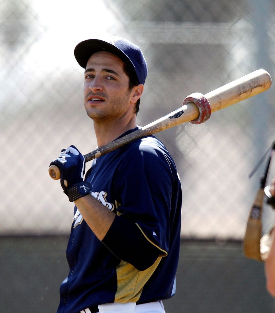 Milwaukee outfielder Ryan Braun's 50-game suspension for violating baseball's drug policy was overturned by an arbitrator, allowing the reigning National League MVP to play. (Associated Press)