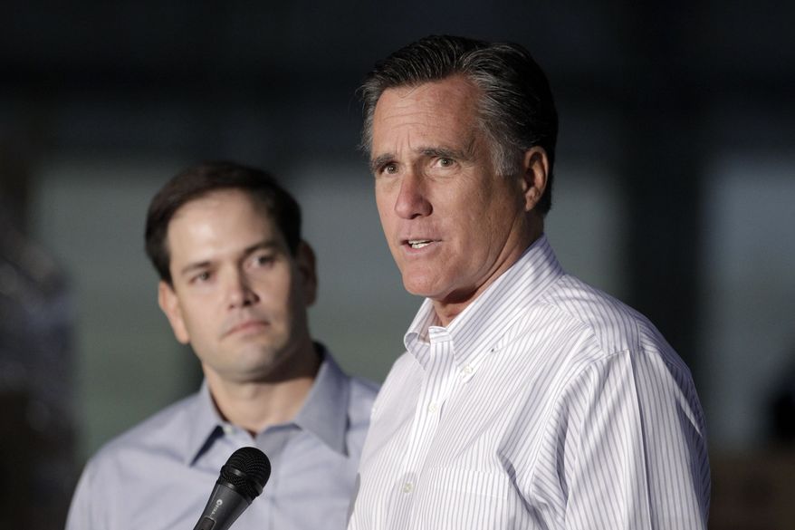 GOP presidential candidate Mitt Romney (right) talks to reporters on Monday, April 23, 2012, as he is joined by Sen. Marco Rubio, Florida Republican, during a news conference before a town-hall-style meeting in Aston, Pa. (Associated Press)