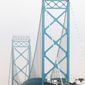 The Ambassador Bridge, which connects Detroit to Windsor, Ontario, is privately owned. A second bridge has been proposed to ease mounting traffic flow. (Associated Press)