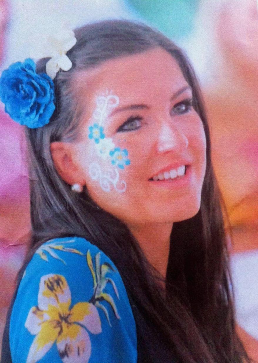 Claire Squires, 30, collapsed and died while running the London Marathon on Sunday. The cause of her death hasn't been determined. (Associated Press)