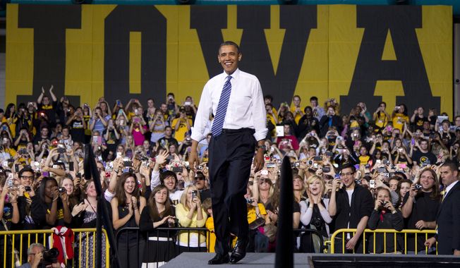 President Obama arrives to speak April 25, 2012, at the University of Iowa in Iowa City, Iowa. (Associated Press)